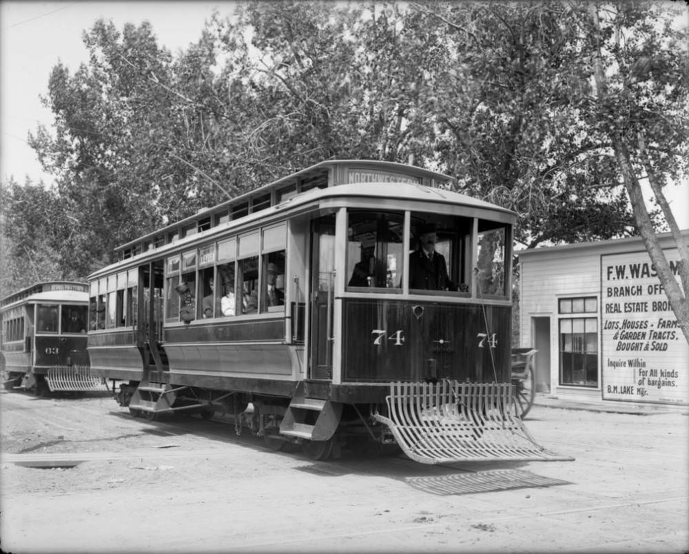 #2 Passengers ride on Denver Tramway cars No. 74 and 63 at West 38th Avenue and Tennyson Street, Denver, 1900