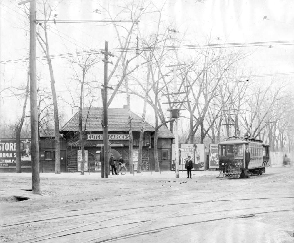 #38 Denver Tramway trolley at the entrance to Elitch Gardens on West 38th Avenue, flanked by billboards, 1905.