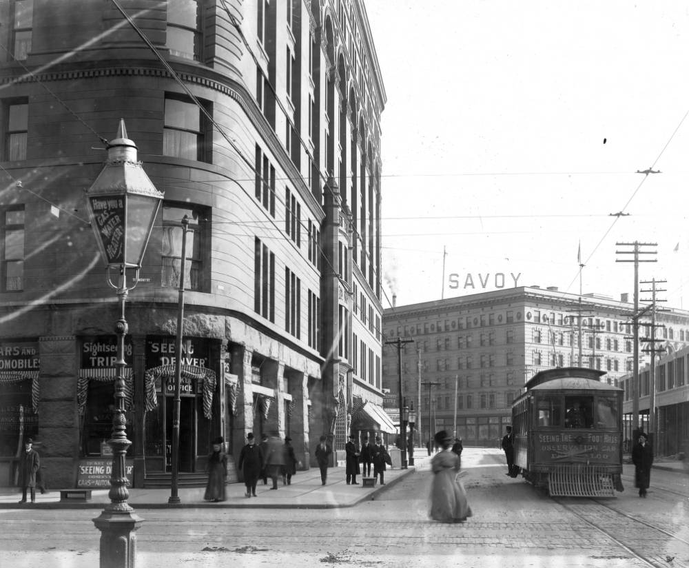 #7 Denver Tramway “Seeing The Foothills” trolley on 17th Street, featuring Brown Palace and Savoy Hotel, 1905.