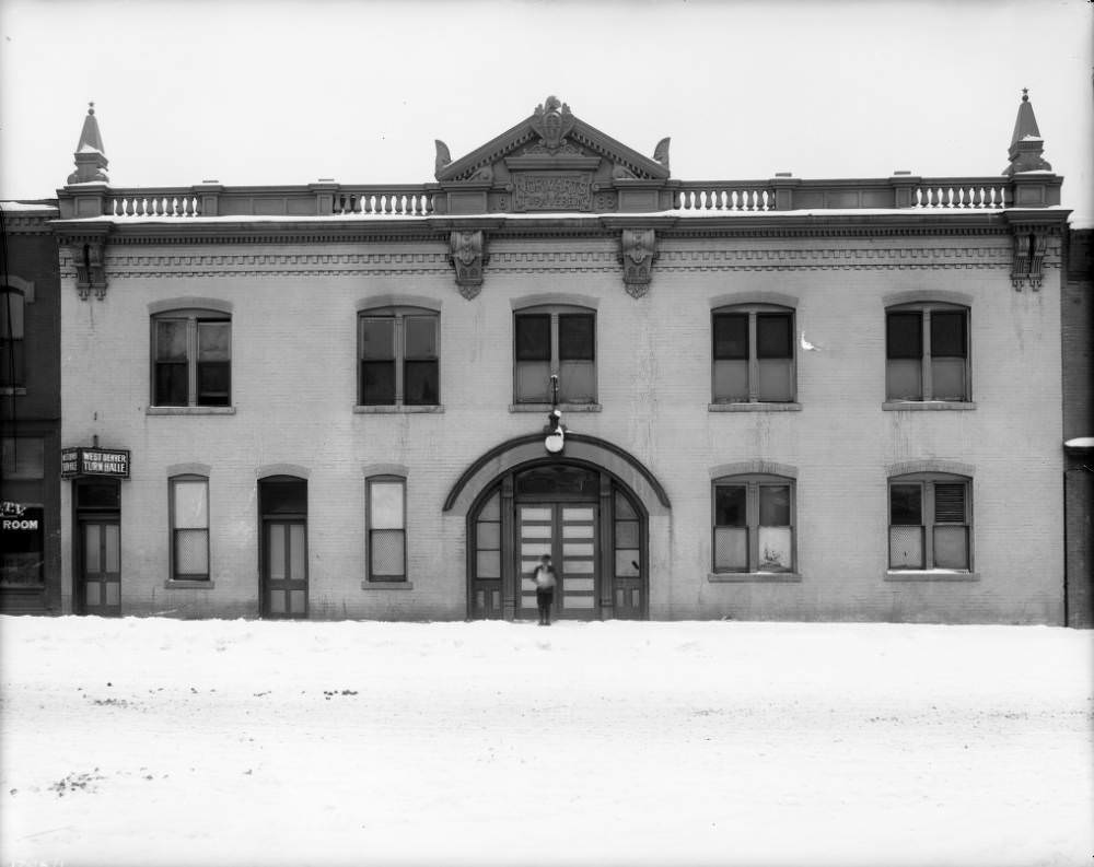 #48 Denver Turnverein Meeting Hall, showcasing its brick architecture and arched entry, 1900