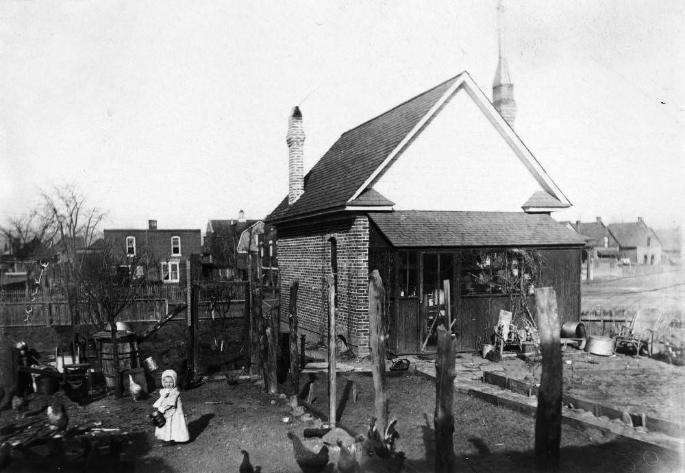 #12 Yard at 742 South Emerson Street with a Girl Feeding Chickens, Denver, 1907.