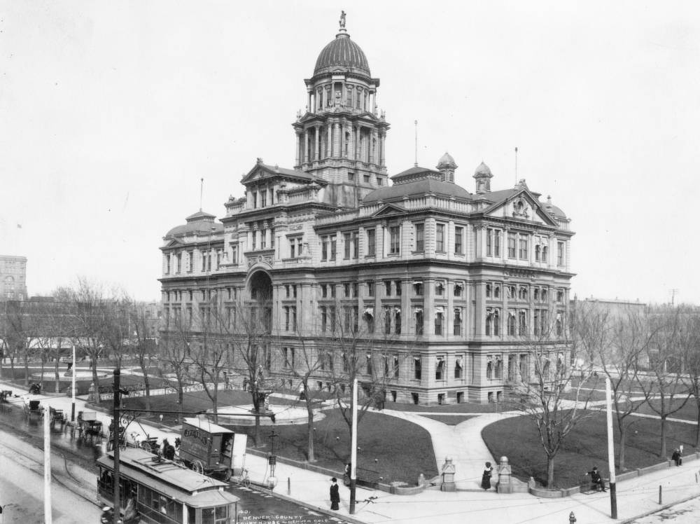 #23 Denver County Courthouse at 15th and Tremont Street, featuring pedestrians and a street car, 1902