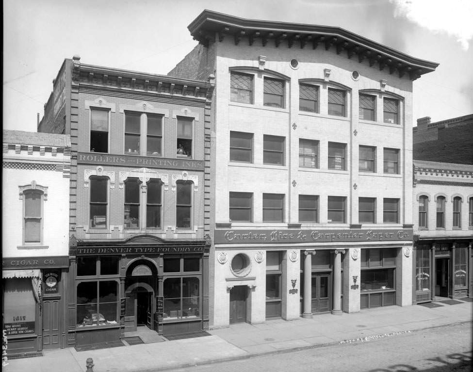 #73 Businesses on Blake Street, featuring various types of signage, 1905