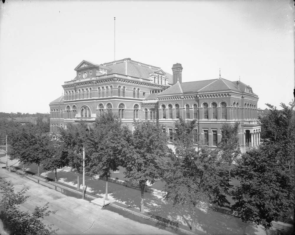 #97 Exterior of Denver High School featuring Victorian Gothic architecture, located at 19th and Stout Streets, 1900s