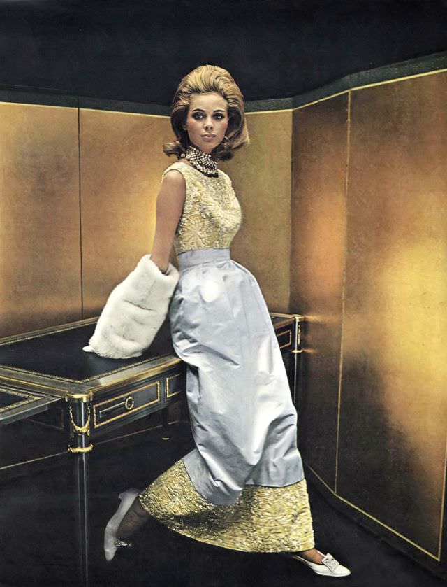 #10 Camilla Sparv in a gown of white satin and embroidered yellow velvet, October 1964