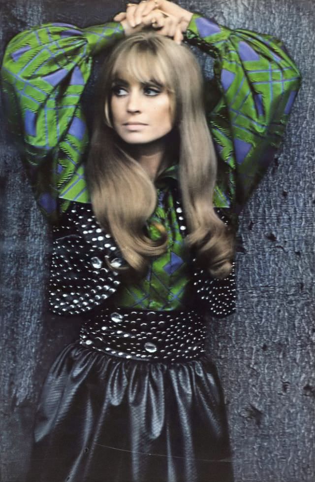 #31 Suzy Kendall in a fake-snake ensemble over an emerald plaid shirt, September 1968