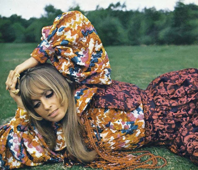 #32 Suzy Kendall in a black vinyl cobra ensemble with red-beaded embroidery, September 1968