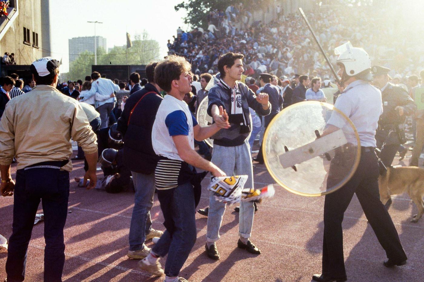 #19 Aftermath of crowd riots during European Cup Final at Heysel Stadium, 1985.