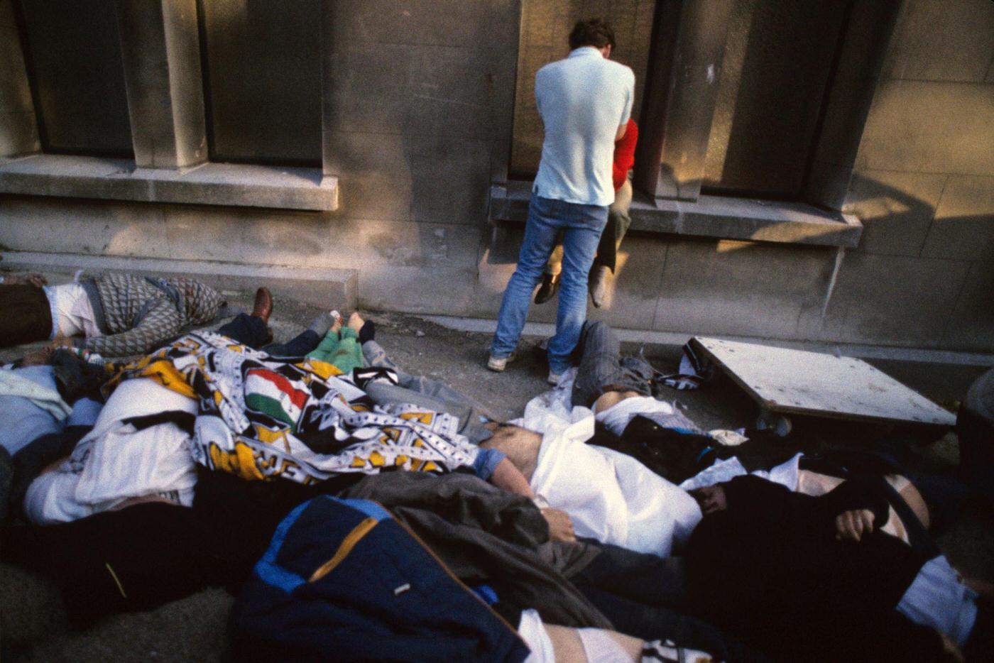 #51 Juventus Fans Console Each Other Beside Victims, Heysel Disaster, 1985.