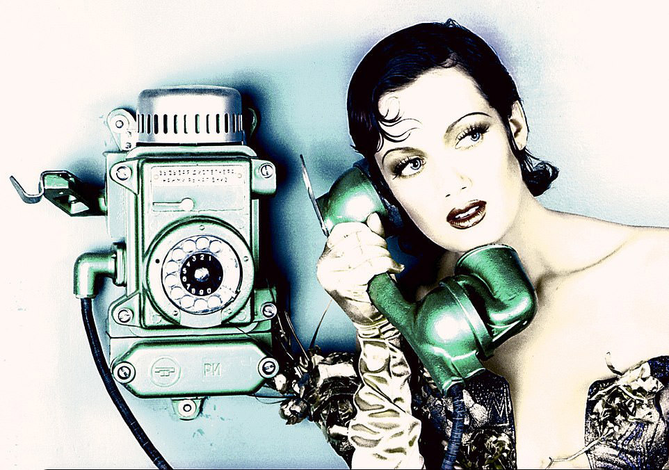 #56 Glamorous Call: Irena in Kyiv speaks on a phone wearing golden gloves, 1997.