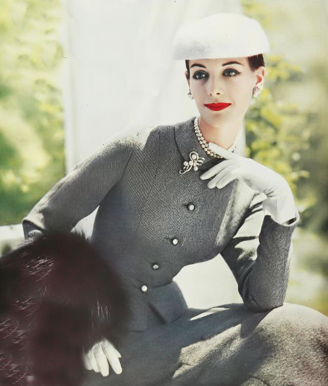 #24 Model in a classic gray tweed suit, 1956.