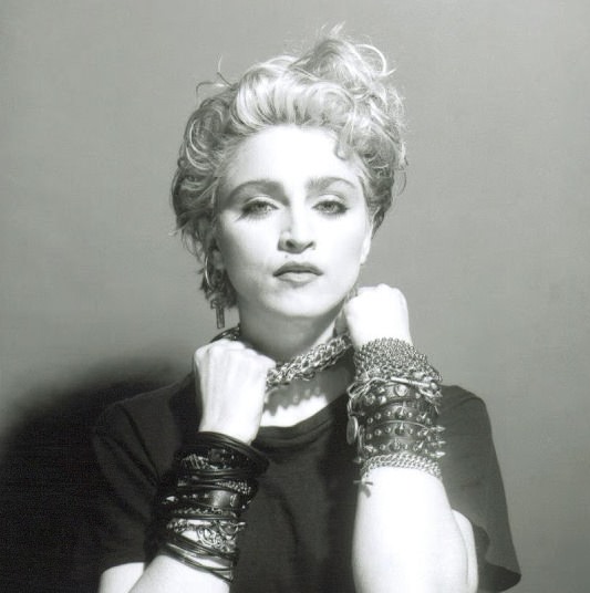 A Belly Button, Platinum Hair, and Pop Stardom: Diving Deep into Madonna’s Iconic Debut Album Photoshoot