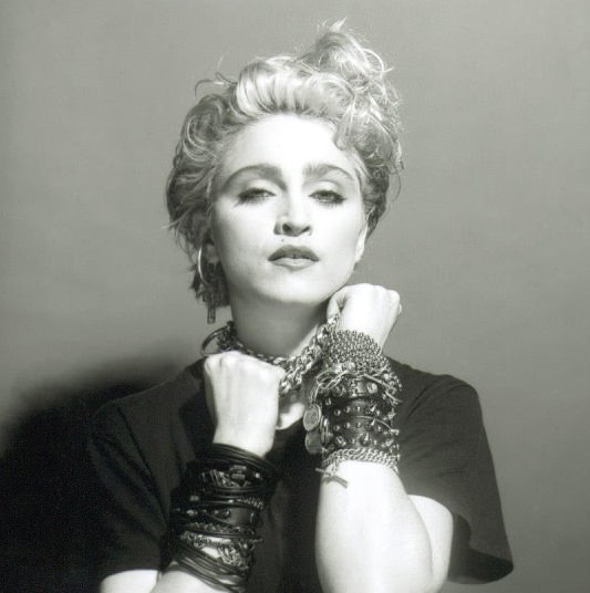 A Belly Button, Platinum Hair, and Pop Stardom: Diving Deep into Madonna’s Iconic Debut Album Photoshoot