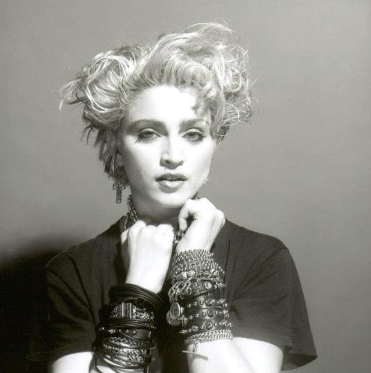 A Belly Button, Platinum Hair, and Pop Stardom: Diving Deep into Madonna’s Iconic Debut Album Photoshoot