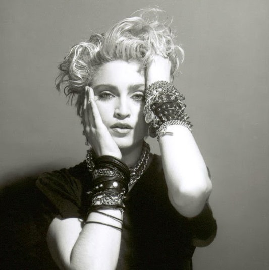 A Belly Button, Platinum Hair, and Pop Stardom: Diving Deep into Madonna’s Iconic Debut Album Photoshoot