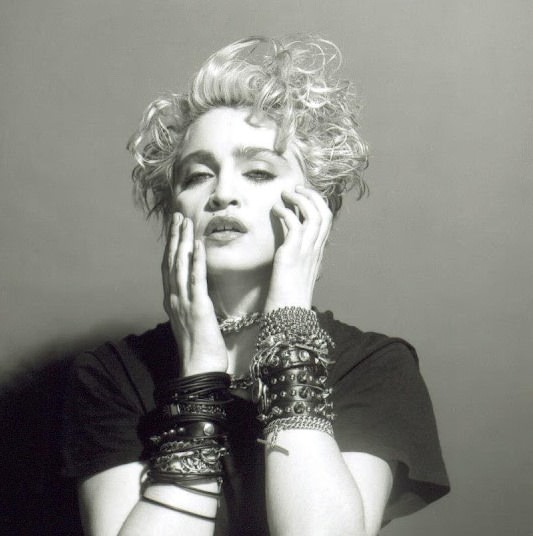 A Belly Button, Platinum Hair, and Pop Stardom: Diving Deep into Madonna’s Iconic Debut Album Photoshoot