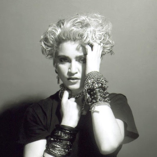 A Belly Button, Platinum Hair, and Pop Stardom: Diving Deep into Madonna’s Iconic Debut Album Photoshoot
