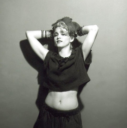 A Belly Button, Platinum Hair, and Pop Stardom: Diving Deep into Madonna’s Iconic Debut Album Photoshoot
