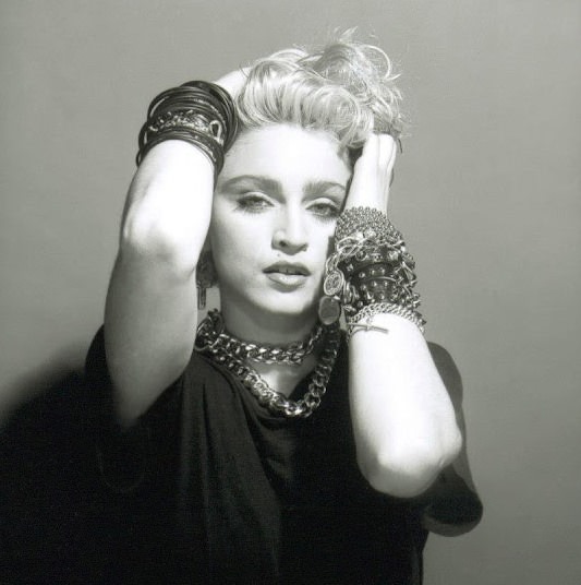 A Belly Button, Platinum Hair, and Pop Stardom: Diving Deep into Madonna’s Iconic Debut Album Photoshoot