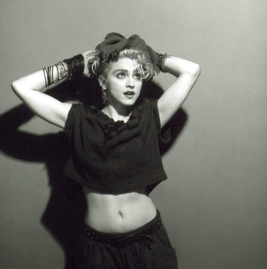 A Belly Button, Platinum Hair, and Pop Stardom: Diving Deep into Madonna’s Iconic Debut Album Photoshoot