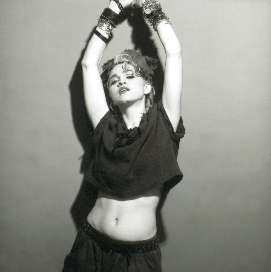 A Belly Button, Platinum Hair, and Pop Stardom: Diving Deep into Madonna’s Iconic Debut Album Photoshoot