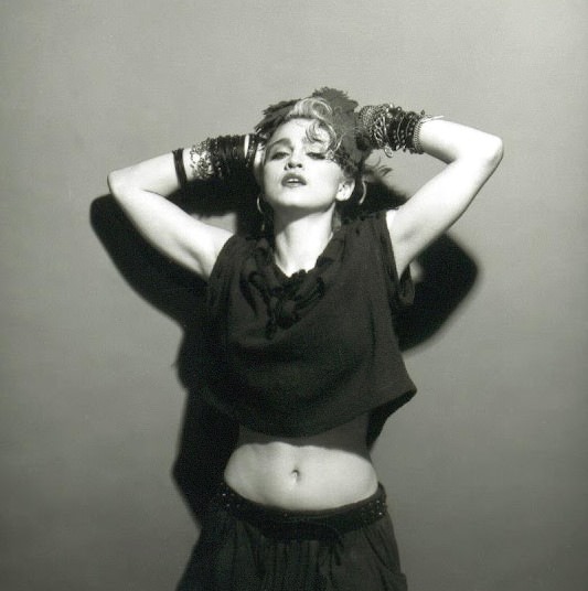 A Belly Button, Platinum Hair, and Pop Stardom: Diving Deep into Madonna’s Iconic Debut Album Photoshoot