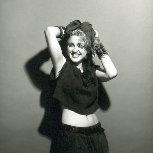 A Belly Button, Platinum Hair, and Pop Stardom: Diving Deep into Madonna’s Iconic Debut Album Photoshoot