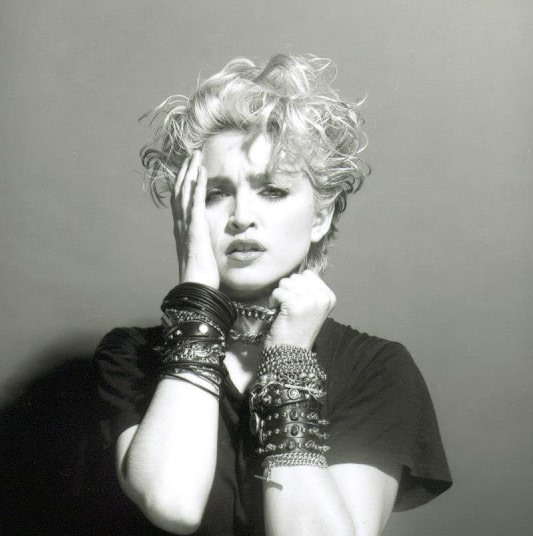 A Belly Button, Platinum Hair, and Pop Stardom: Diving Deep into Madonna’s Iconic Debut Album Photoshoot