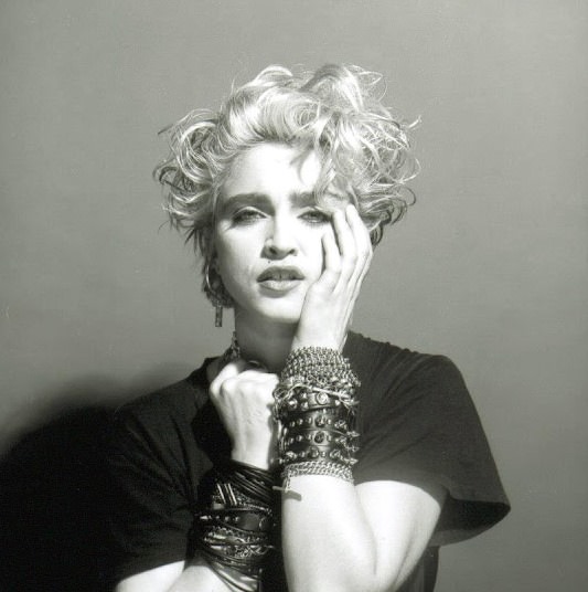 A Belly Button, Platinum Hair, and Pop Stardom: Diving Deep into Madonna’s Iconic Debut Album Photoshoot