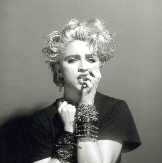A Belly Button, Platinum Hair, and Pop Stardom: Diving Deep into Madonna’s Iconic Debut Album Photoshoot