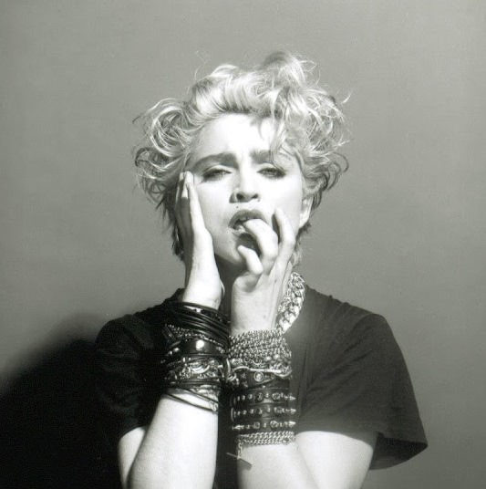 A Belly Button, Platinum Hair, and Pop Stardom: Diving Deep into Madonna’s Iconic Debut Album Photoshoot
