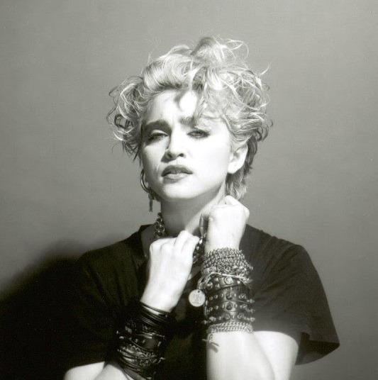 A Belly Button, Platinum Hair, and Pop Stardom: Diving Deep into Madonna’s Iconic Debut Album Photoshoot