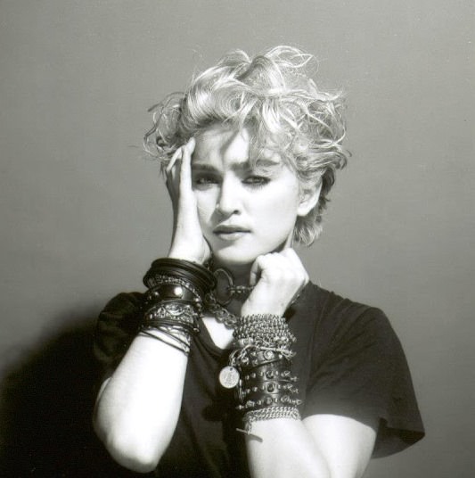 A Belly Button, Platinum Hair, and Pop Stardom: Diving Deep into Madonna’s Iconic Debut Album Photoshoot