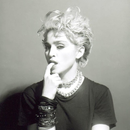 A Belly Button, Platinum Hair, and Pop Stardom: Diving Deep into Madonna’s Iconic Debut Album Photoshoot