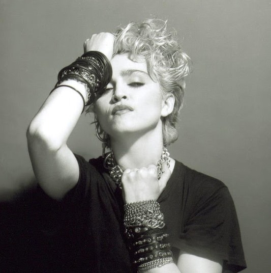 A Belly Button, Platinum Hair, and Pop Stardom: Diving Deep into Madonna’s Iconic Debut Album Photoshoot