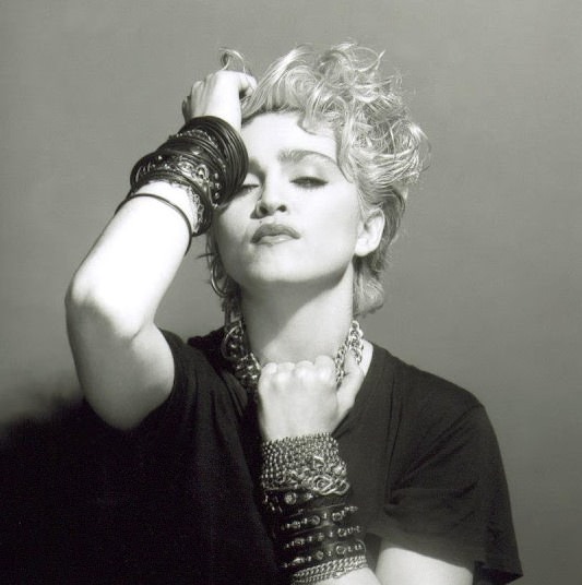 #79 A Belly Button, Platinum Hair, and Pop Stardom: Diving Deep into Madonna’s Iconic Debut Album Photoshoot #79
