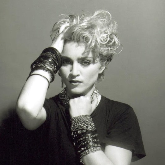 A Belly Button, Platinum Hair, and Pop Stardom: Diving Deep into Madonna’s Iconic Debut Album Photoshoot