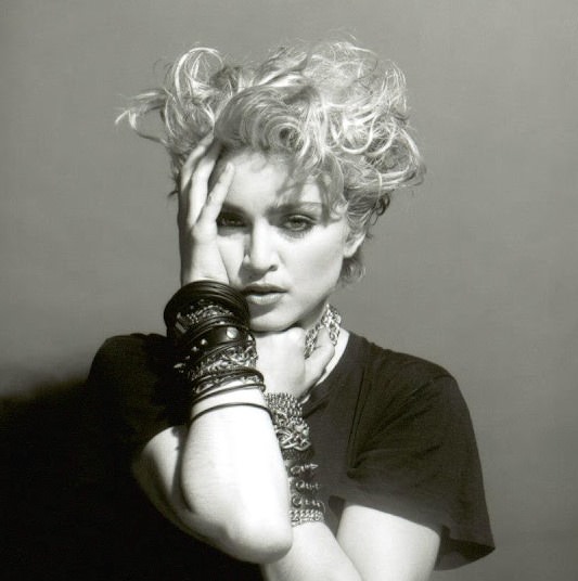 A Belly Button, Platinum Hair, and Pop Stardom: Diving Deep into Madonna’s Iconic Debut Album Photoshoot
