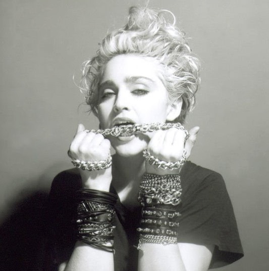 A Belly Button, Platinum Hair, and Pop Stardom: Diving Deep into Madonna’s Iconic Debut Album Photoshoot