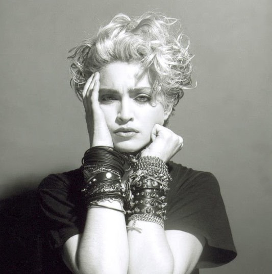 A Belly Button, Platinum Hair, and Pop Stardom: Diving Deep into Madonna’s Iconic Debut Album Photoshoot