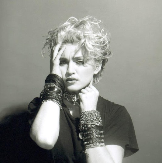 A Belly Button, Platinum Hair, and Pop Stardom: Diving Deep into Madonna’s Iconic Debut Album Photoshoot