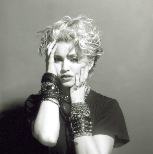 A Belly Button, Platinum Hair, and Pop Stardom: Diving Deep into Madonna’s Iconic Debut Album Photoshoot