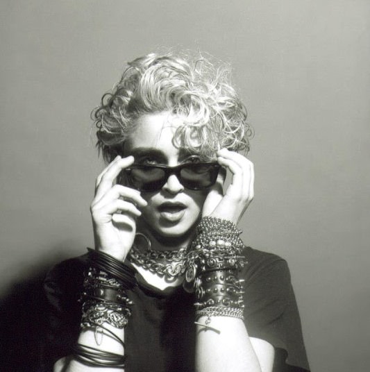 #95 A Belly Button, Platinum Hair, and Pop Stardom: Diving Deep into Madonna’s Iconic Debut Album Photoshoot #95