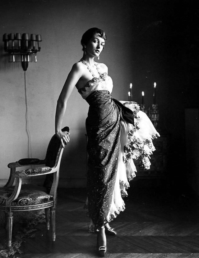 #13 Countess Maxime de la Falaise in a dress by Schiaparelli, 1950.