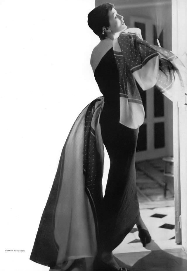 #20 Maxime de la Falaise in shantung evening sheath with organdy kerchiefs by Schiaparelli, 1950.