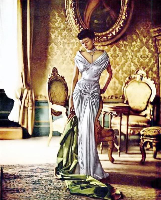 #23 Maxime de la Falaise in a Charles James gown for a Modess ad, 1950.