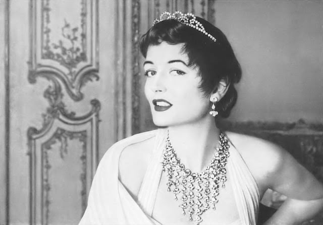 #26 Maxime de la Falaise for Pond’s cold cream ad, 1953.