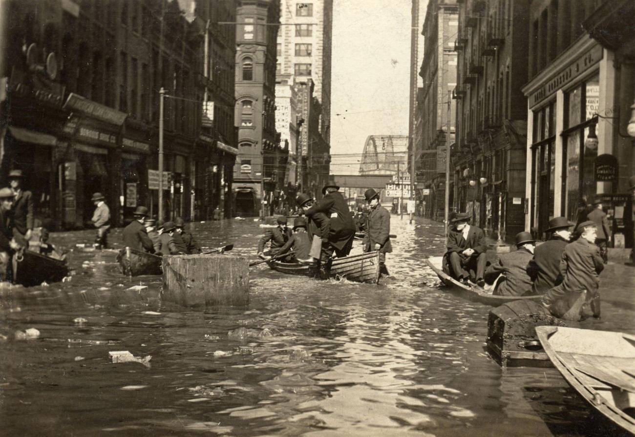 #5 Men and boys navigating floodwaters at the intersection of Sixth & Liberty Streets in Pittsburgh, 1907.