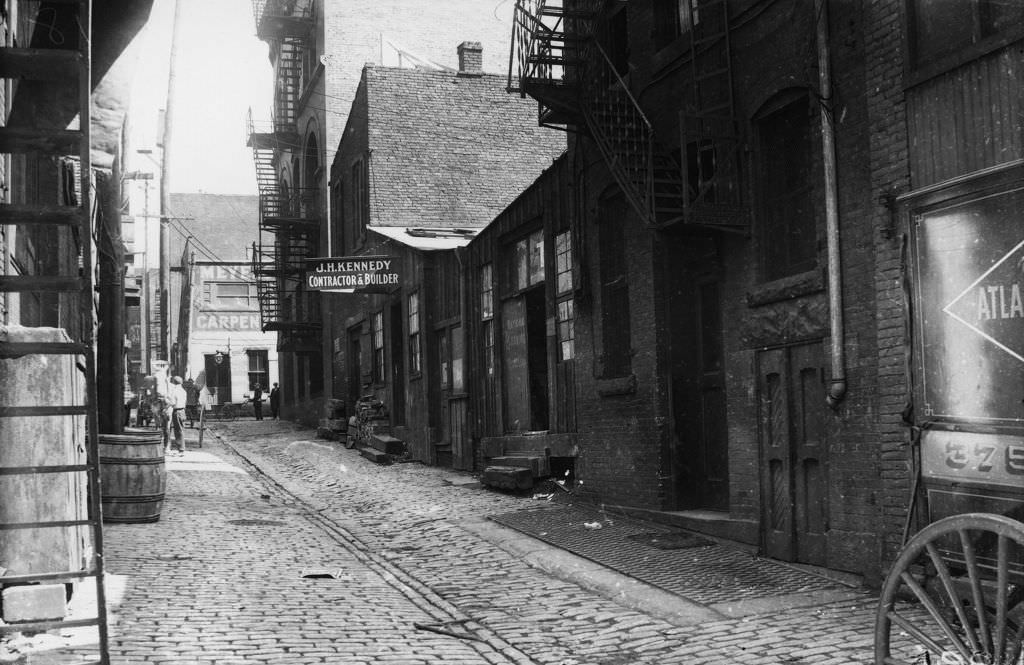 #92 Lemon Alley, cobblestone street and J.H. Kennedy offices, 1912