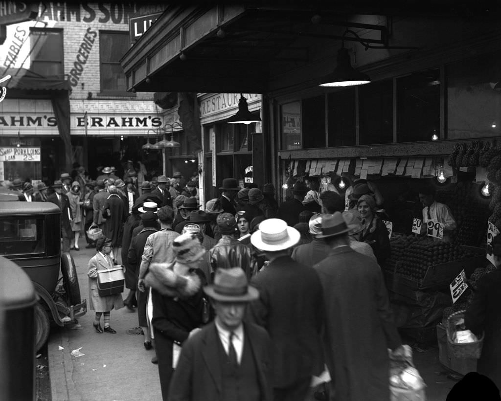 #30 Sidewalk Shoppers in Front of Ruddy’s Sandwich Shop at Diamond Street, 1928.
